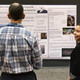 Alexia Bravo presenting her poster on small-scale renewable energy at AGU. Image: Brian Kahn / Earther